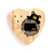 Heart shaped wood peg game with a black bear peeking over a wood stump with North Dakota on it, shown with two wood pegs in the game.