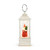 White lit musical lantern with a Santa figure inside holding a small tree.