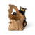A sitting black bear behind a hollowed wood log that serves as a pencil holder, displayed angled to the right.