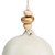 Close up of the top of a cream and gold bell that says "Strong Beautiful You". There are beads at the top of the bell.