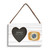 A rectangular hanging white wood frame ornament with a graphic image of a yellow sunflower on an orange background with a 2x2 heart shaped opening for a photo.