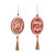 Two hanging wood round ornaments in red and white. One says "Joy" and the other says "Merry and Bright". Each ornament has a gold tassel hanging from the bottom, displayed angled to the right.