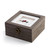 A square gray wood keepsake box with a metal clasp. The top has pebble art of a red bird on a branch that says "love".