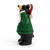 Left profile view of a sculpted figurine of a black bear wearing a green and white snowflake sweater, a Santa hat and holding a white garland that says "Merry".