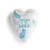 A white heart shaped keeper box with line drawn bluebirds and florals that says "Trust in the Lord".