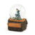 A musical snow globe with a black bear figurine holding white flowers sitting inside. The base looks like a wood tree stump with a place for customization, displayed angled to the left.