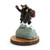 A figurine of two black bears wearing backpacks on the top of a snowy mountain that says "The Summit", on a base that looks like a wood stump, displayed angled to the left.