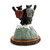 Back view of a figurine of two black bears wearing backpacks on the top of a snowy mountain that says "The Summit", on a base that looks like a wood stump.