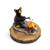 A sculpted figure of a black bear roasting a marshmallow over a campfire. The base has a rectangular space for personalization.