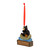 A hanging ornament of a black bear paddling a canoe on a rectangular base that can be personalized, displayed angled to the left.