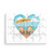 A 24 piece postcard puzzle with heart shaped graphic artwork of two beach chairs and an umbrella at the beach.