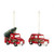 A set of two different blown glass red truck ornaments. One has a Christmas tree on top, displayed angled to the right.