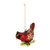 A red and gold cardinal bird hanging ornament with a small evergreen branch, displayed angled to the left.