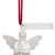 Detail view of the tag on a mini white bell ornament shaped like an angel playing a horn. There is a tag at the top with the word "Celebrate".