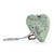 Heart shaped sculpture with a silver tassel and metal key attached. The heart has the image of Pooh hanging from a balloon on a light green background and says "May your dreams take you everywhere", displayed angled to the right.