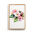A light wood framed wall art of a watercolor apple blossom.