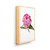 A light wood framed wall art of a watercolor pink rose, displayed angled to the right.