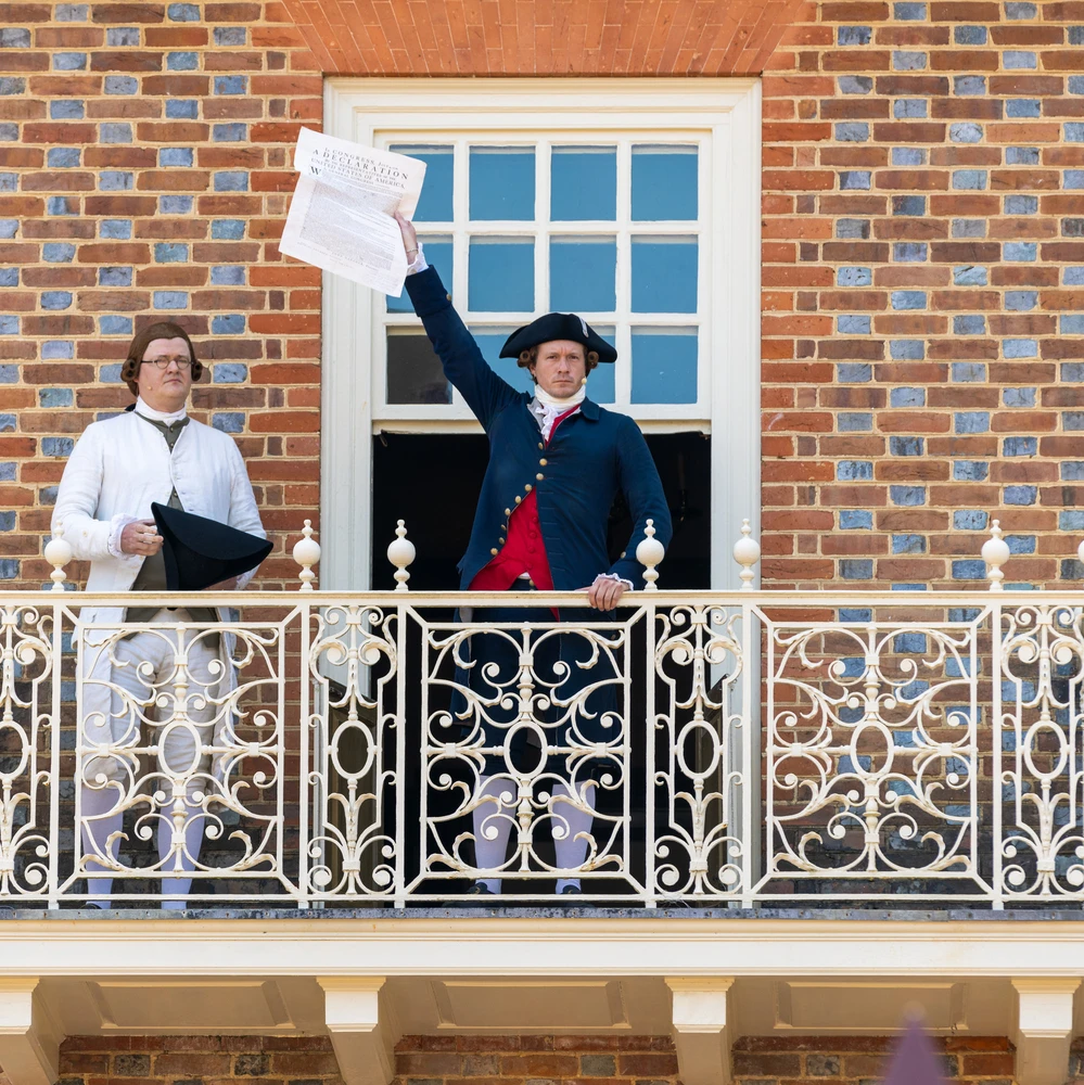 Nation Builder Thomas Jefferson, portrayed by Kurt Smith, reads the Declaration of Independence from the balcony at the Capitol at Colonial Williamsburg. Cash Arehart (l). Photo by Brendan Sostak, The Colonial Williamsburg Foundation
Photographer, all rights reserved.