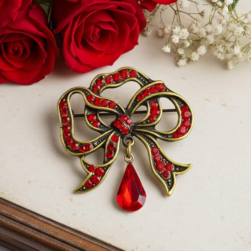 Red Ribbon Crystal Brooch by Anne Koplik