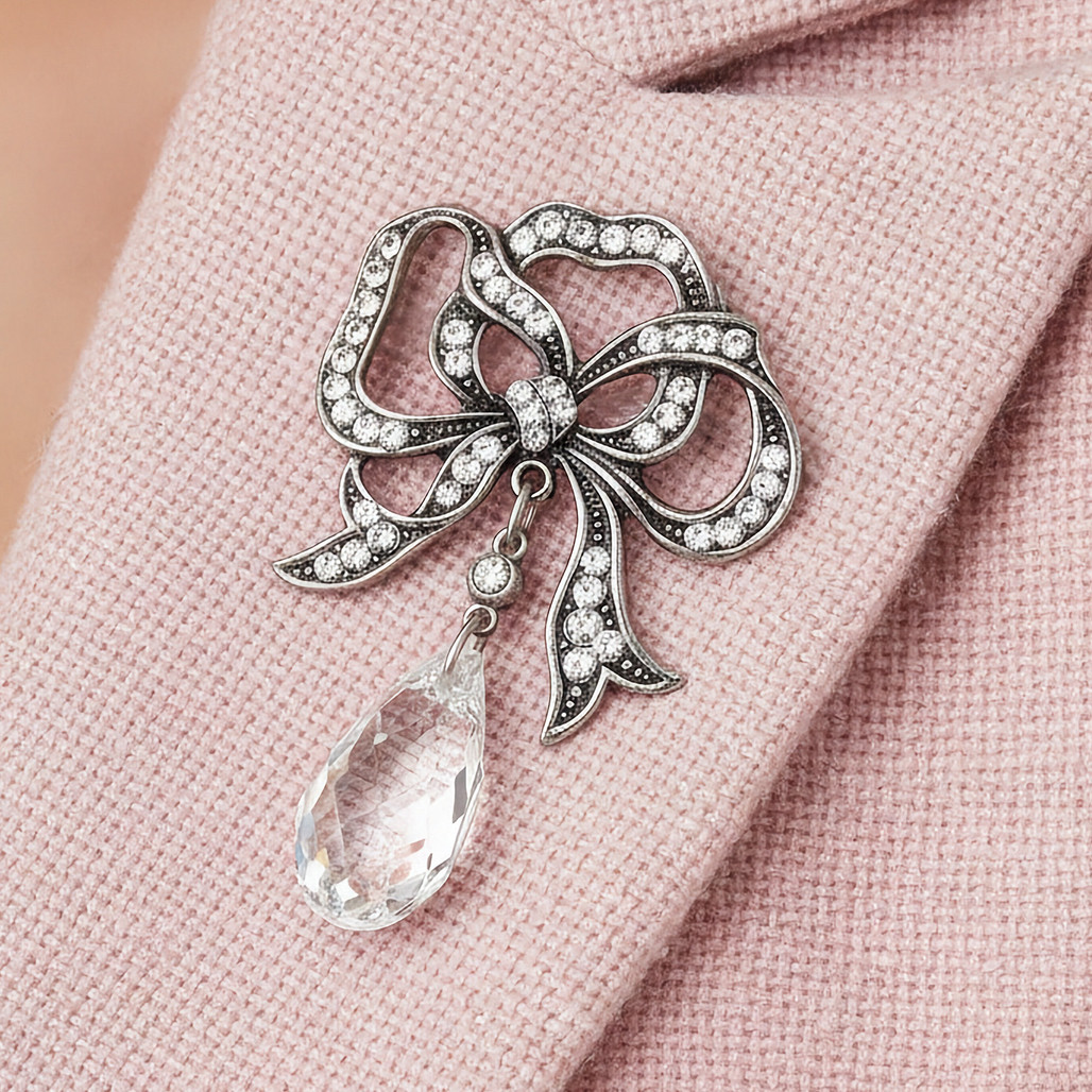 Sparkling Crystal Bow Teardrop Brooch by Anne Koplik | The Shops at Colonial Williamsburg