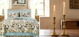 Picture of WILLIAMSBURG Brand Garden Images and Christiana bedding and brass beehive candlesticks.