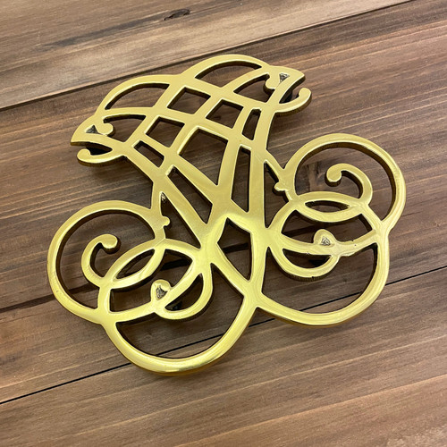 Thomas Jefferson Cypher Brass Trivet | The Shops at Colonial Williamsburg