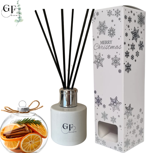 Limited edition Winter Spice & Clementine reed diffuser. A warm, citrusy blend of clementine and festive spice in a seasonal snowflake gift box. Hand-poured in the UK. 100ml diffuser, ideal Christmas gift.