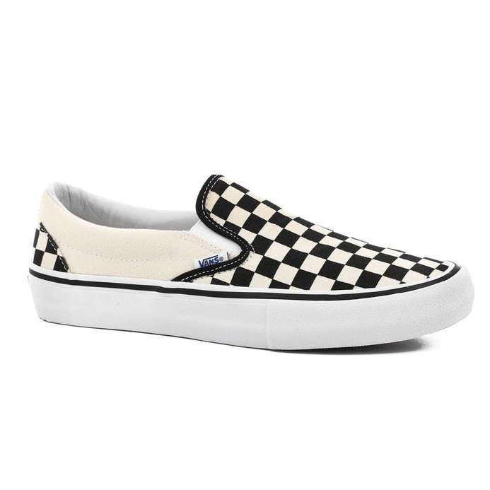 slip on checkered vans black and white