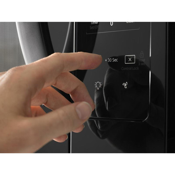 Whirlpool® 1.7 cu. ft. Microwave Hood Combination with Electronic Touch Controls YWMH31017HB Whirlpool® 1.7 cu. ft. Microwave Hood Combination with Electronic Touch Controls YWMH31017HB