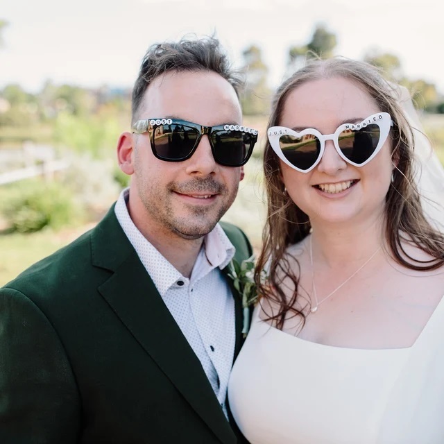 Customer photo featuring wedding couple and decorations from Gem’s Wedding Supplies