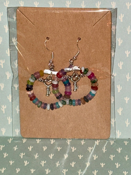beaded hoop earrings with key charm. multicolor jasper beads.