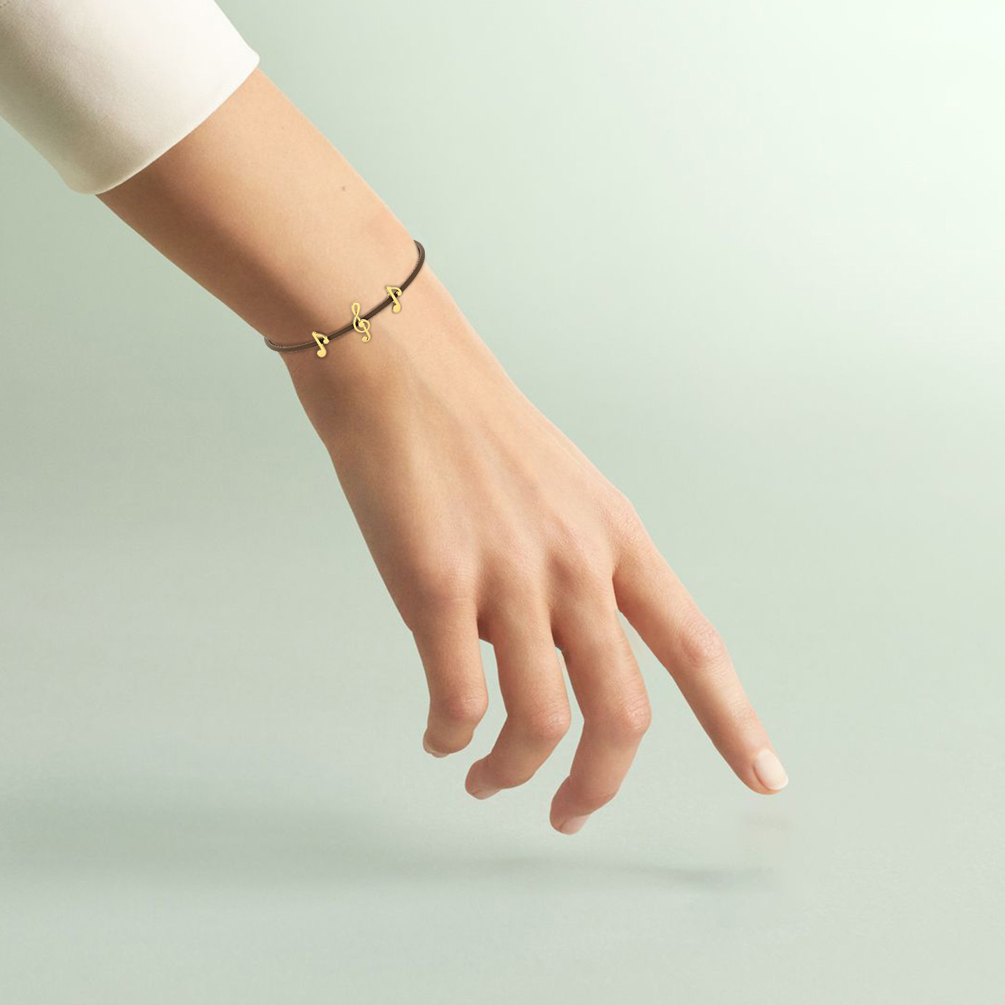 أسورة مفتوحة ذهب نوتات موسيقية عيار 18 قيراط - 4 أسورة مفتوحة ذهب نوتات موسيقية عيار 18 قيراط - 4