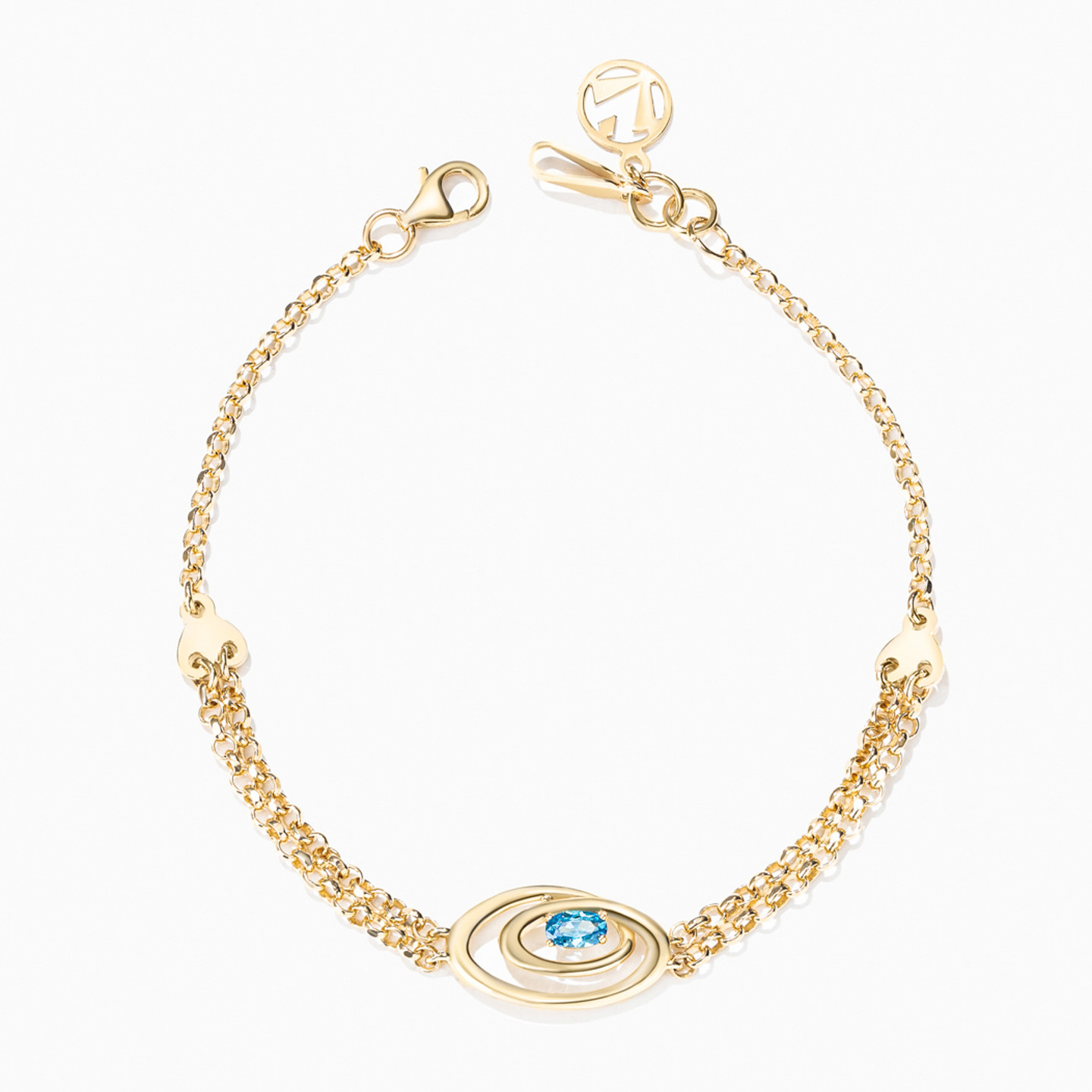 Open Oval Frames Blue Stone Chain Bracelet in 18K Gold Open Oval Frames Blue Stone Chain Bracelet in 18K Gold