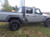 profile of gray OMEGA SIDES : Jeep Gladiator Side Door Star Decals Stripe 2020-2024