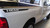 rear of white Dodge Ram Hemi Side Stripes HUSTLE 2009-2018 (2019-2021 Classic)
