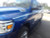 front view of blue 2019 Dodge Ram Truck Side Stripes RAM EDGE SIDE KIT 2019-2024