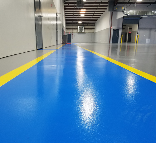 Safety Yellow LineGevity floor striping over Safety Blue floor epoxy Safety Yellow LineGevity floor striping over Safety Blue floor epoxy