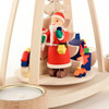 Authentic German Pyramids ON SALE! | Features Santa holding lantern, handcarved toys including train set, bassinet, toy box filled with blocks and yellow duck, intricate rotating tree in center, and 4 premium brass tealight candle holders. USE: Place the candle in the designated holders on the pyramid. Heat from the candle will slowly cause the blades to rotate. | 1-Tier Santa with Toys, 10" 403/P/1093/D | Handmade in the Erzgebirge region of Seiffen, Germany | Lindenhaus Imports in Helen, Ga