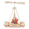 Authentic German Pyramids ON SALE! | Features Santa holding lantern, handcarved toys including train set, bassinet, toy box filled with blocks and yellow duck, intricate rotating tree in center, and 4 premium brass tealight candle holders. USE: Place the candle in the designated holders on the pyramid. Heat from the candle will slowly cause the blades to rotate. | 1-Tier Santa with Toys, 10" 403/P/1093/D | Handmade in the Erzgebirge region of Seiffen, Germany | Lindenhaus Imports in Helen, Ga