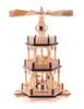 Authentic German Pyramids ON SALE! | Features 3 sheep and 2 angels on the middle rotor, hand-carved nativity figures including the Three Wise Men, Angel, Mary, Joseph, and Baby Jesus on the bottom rotor, and 4 brass candle holders. USE: Place the candle in the designated holders on the pyramid. Heat from the candle will slowly cause the blades to rotate. | 3-Tier Nativity Pyramid, 13" 085/P/202/D | Handmade in the Erzgebirge region of Seiffen, Germany | Lindenhaus Imports in Helen, Ga