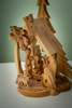 Hand-Carved Olivewood from Bethlehem ON SALE | Tree Shaped Grotto with Nativity Scene under Palm and Angel, 6" | Lindenhaus Imports in Helen, Ga