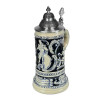 Thewalt 1893 'Fridolin the Drunken Son' Beer Stein T1341/EZ | Thewalt 1893 Collection | Features shield and cherubs with musical instruments on both sides | Thewalt 1893 Collection | 'Fridolin the Drunken Son' Stein, 0.75L |