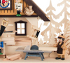 Authentic German Pyramids ON SALE! | Features: 3 handcrafted nutcrackers, 2 woodshop workers, 3D trees and decorative rocking horses throughout, tiny handcarved tools, and LED fairy lights | The Nutcracker Workshop, 11" 202/CA/90544/D/7-110 | Handmade in the Erzgebirge region of Seiffen, Germany | Lindenhaus Imports in Helen, Ga