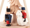 Authentic German Pyramids ON SALE! | Features 3 handcrafted wooden figures known for their intergral part of the Erzgebirge folk art and incredible craftsmanship detailed in the larger handcarved rotating tree. USE: Warm-Air pyramids do not require candles. Instead, they rely on the temperature difference created by ambient warmth. When the temperature difference between the base and the top is significant enough, the fan begins to spin. As the fan rotates, it sets the entire pyramid in motion. | 1-Tier Mini Olbernhauer Marktfiguren (Wooden Figures), 4" Warm-Air Pyramid 074/P/240/D/5 | Handmade in the Erzgebirge region of Seiffen, Germany | Lindenhaus Imports in Helen, Ga
