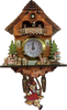 Elegant Clock Magnets ON SALE! || Features 3D balcony with tiny dancers, cuckoo bird picture, couple sitting on bench with dog, small boy and girl on rocking horses, and gold trim around face of clock. Battery included. || 3D Swinging Girl Cuckoo Clock Magnet with Real Functioning Clock, 7" M883 || Lindenhaus Imports in Helen, Ga