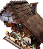 Upper view of authentic Black Forest cuckoo clock handcrafted in Germany! Features hand-carved and hand-laid shingles.