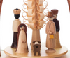 Authentic German Pyramids ON SALE! | Features  handcrafted nativity scene with Joseph, Mary, Jesus, and 3 Wisemen, incredible craftsmanship detailed in the tree handcarved out of shavings in the center, and 4 brass candle holders. Heat from the candle will slowly cause the blades to rotate. | 1-Nativity Scene with Three Wisemen, 10" 085/P/100/D/G | Handmade in the Erzgebirge region of Seiffen, Germany | Lindenhaus Imports in Helen, Ga