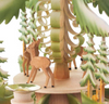 Authentic German Pyramids ON SALE! | Features handcrafted forest animals, 4 deer on rotating platform, incredible craftsmanship detailed in the massive tree handcarved out of shavings in the center, 4 premium brass candle holders. USE: Place the candle in the designated holders on the pyramid. Heat from the candle will slowly cause the blades to rotate. | 1-Tier Carved Forest and Deer, 13" 085/P/642/D | Handmade in the Erzgebirge region of Seiffen, Germany | Lindenhaus Imports in Helen, Ga