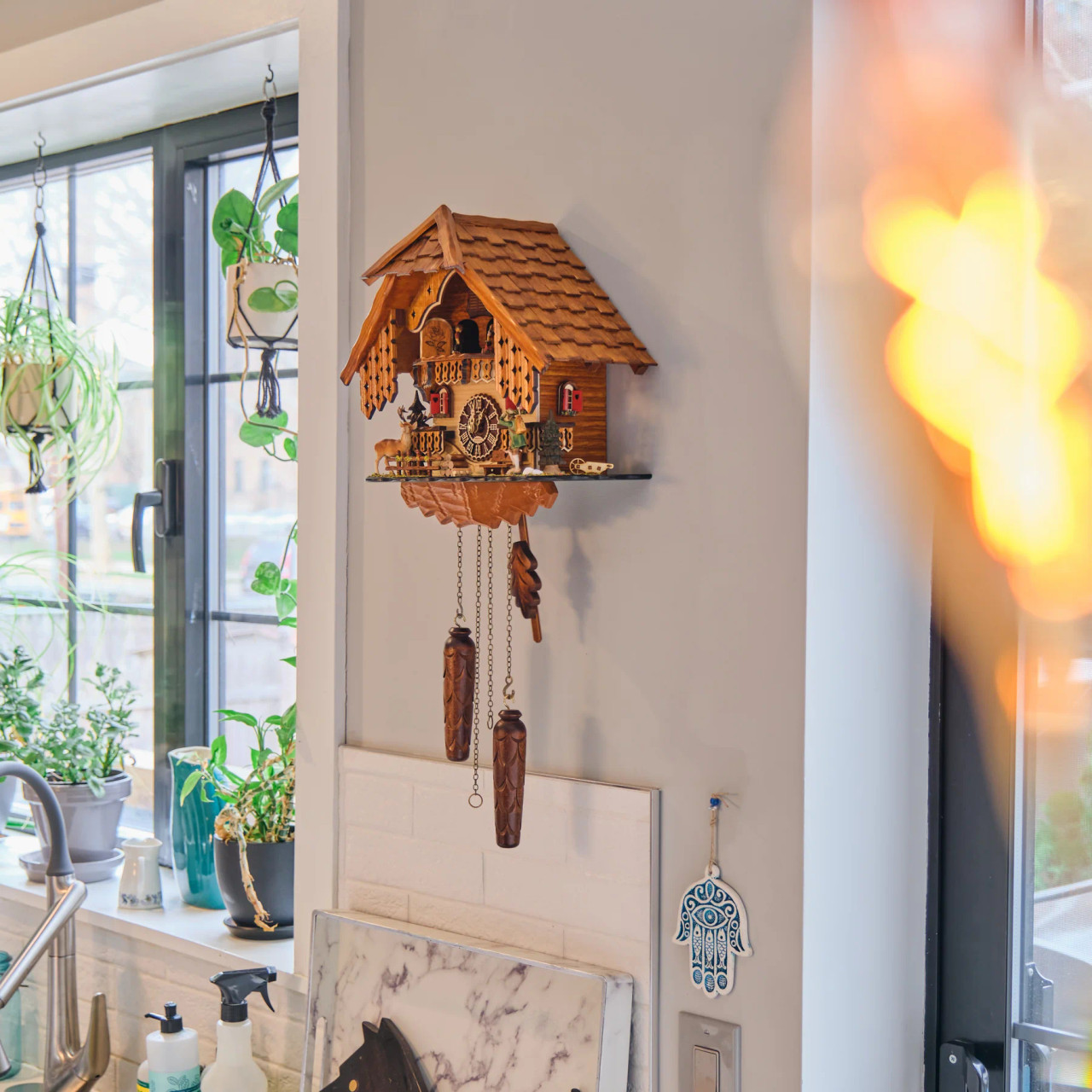 Rheinberg Musical Chalet German Quartz Cuckoo Clock with Alpine Hunter and Deer by Trenkle Uhren GmbH - Hermle 64000