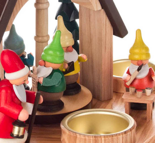 Authentic German Pyramids ON SALE! | Features: handcrafted Santa, 4 Elves each making their own craft, hand-painted clock at the top of the house, and 3 brass tealight candle holders. USE: Place the candle in the designated holders on the pyramid. Heat from the candle will slowly cause the blades to rotate. | 1-Tier Santa and Elves Pyramid, 10" 085/P/1013/D | Handmade in the Erzgebirge region of Seiffen, Germany | Lindenhaus Imports in Helen, Ga Authentic German Pyramids ON SALE! | Features: handcrafted Santa, 4 Elves each making their own craft, hand-painted clock at the top of the house, and 3 brass tealight candle holders. USE: Place the candle in the designated holders on the pyramid. Heat from the candle will slowly cause the blades to rotate. | 1-Tier Santa and Elves Pyramid, 10" 085/P/1013/D | Handmade in the Erzgebirge region of Seiffen, Germany | Lindenhaus Imports in Helen, Ga